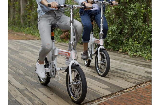 Airwheel R5 electric moped bike is powered by lithium-ion battery. 
